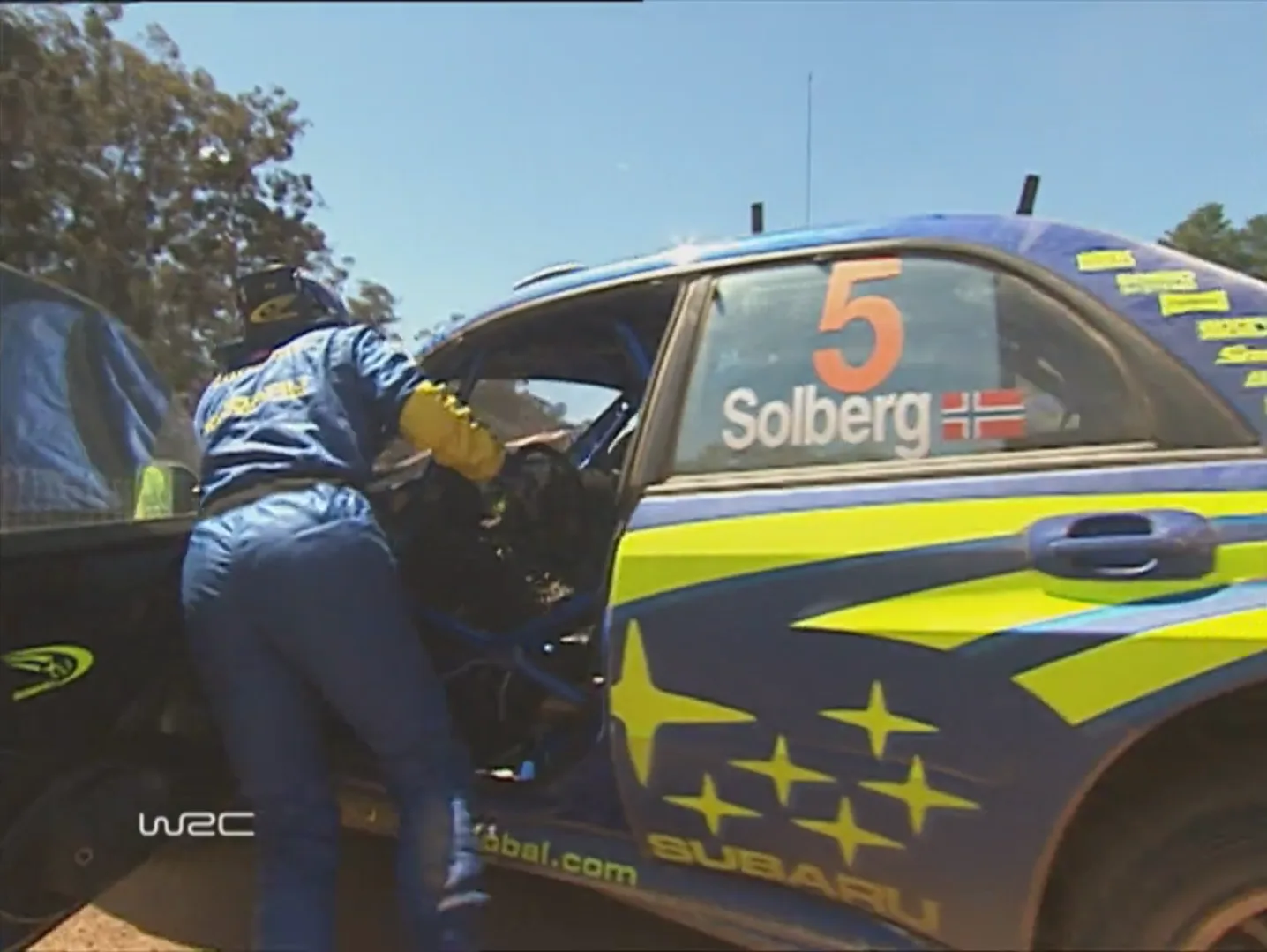 Solberg dragging his car off the stop control